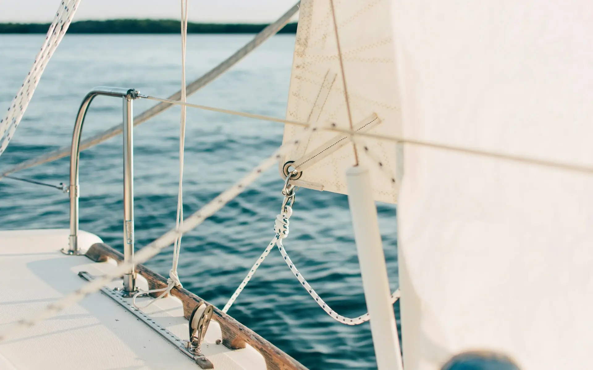 A close-up of a sailing boat on the water.