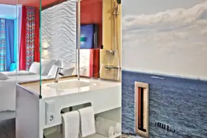 Doppelzimmer Ein Raum mit einem Bett und einem Waschbecken.